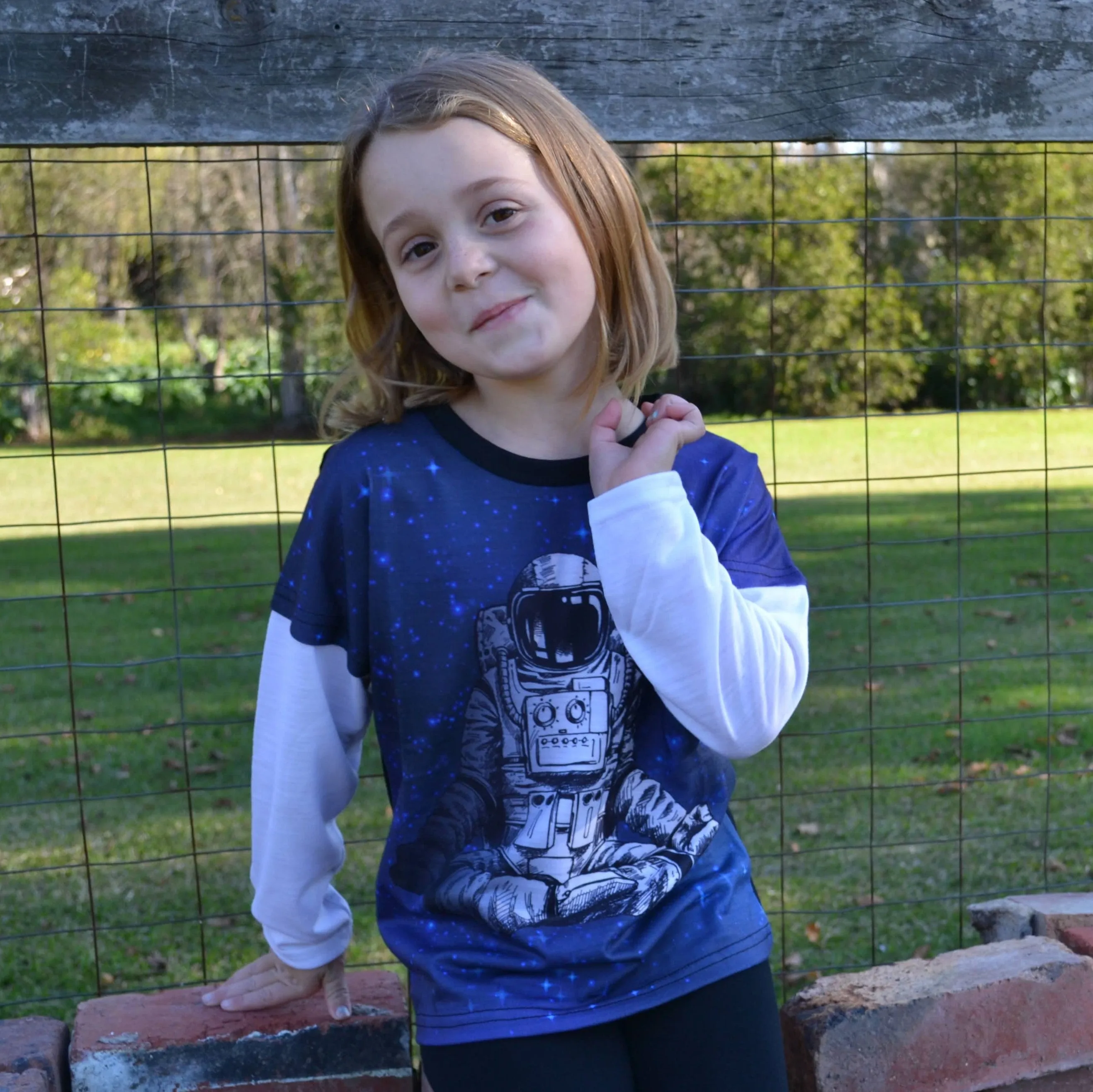Meditating Long sleeve Kids T-shirt